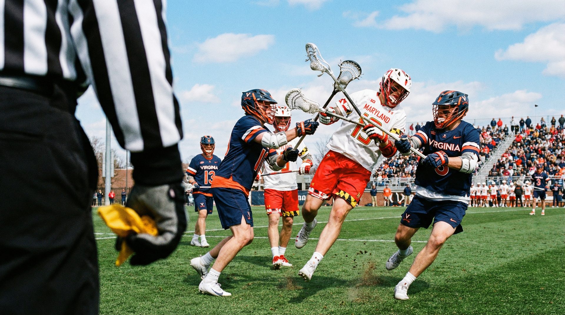 Girls lacrosse game action supported by Kansas City officials