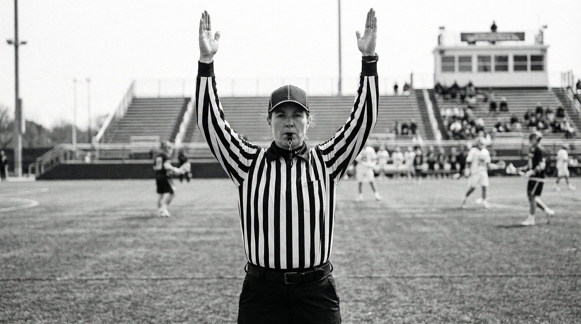 Kansas City lacrosse official watching game action